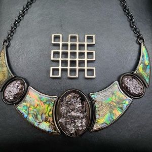 Unique Vintage Necklace. Moonstone like material with round stone like clusters.